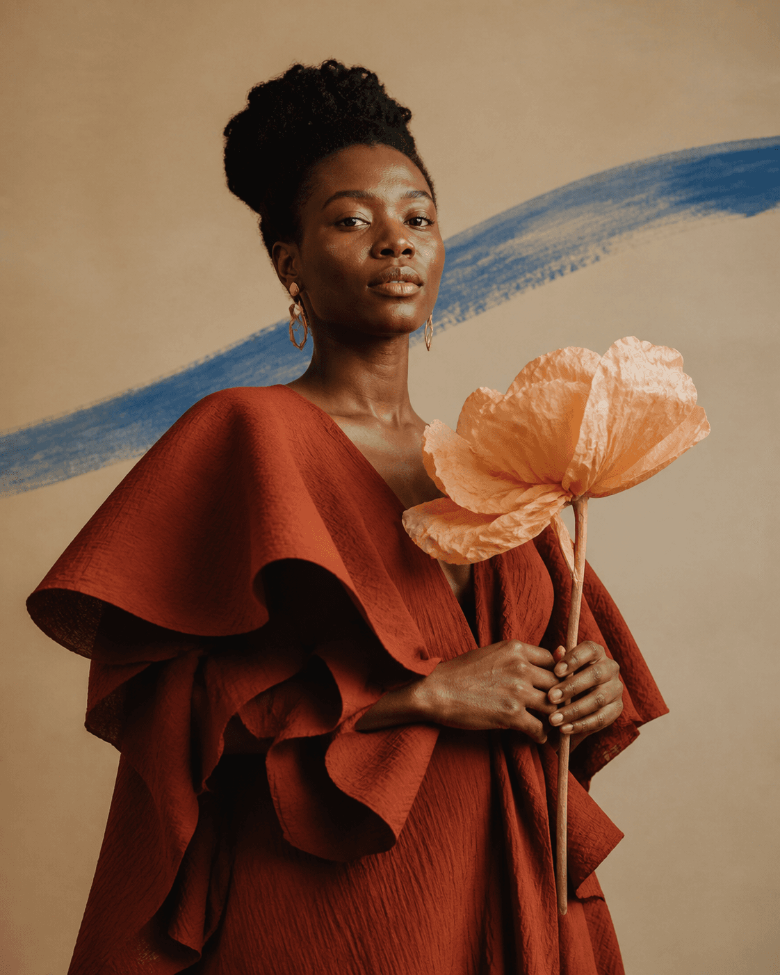 Artistic portrait with a paper flower